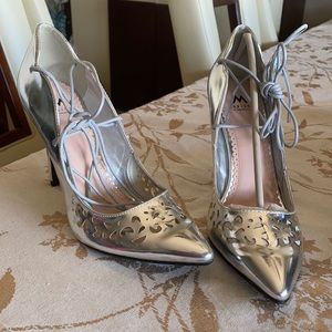 Silver heels. Never wore it